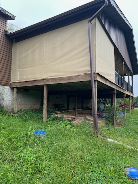 Porch enclosure panels on a raised deck in southeastern Ohio