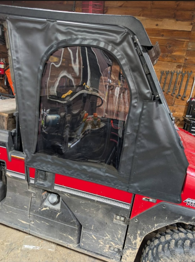 Custom soft door on a red side by side in southeastern Ohio