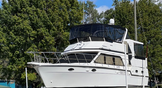 White cabin cruiser prepared for custom canvas work in southeastern Ohio