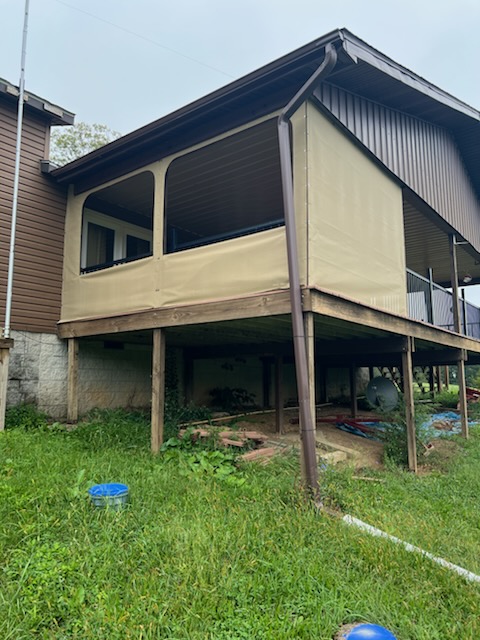 Enclosed porch on a two story home in southeastern Ohio