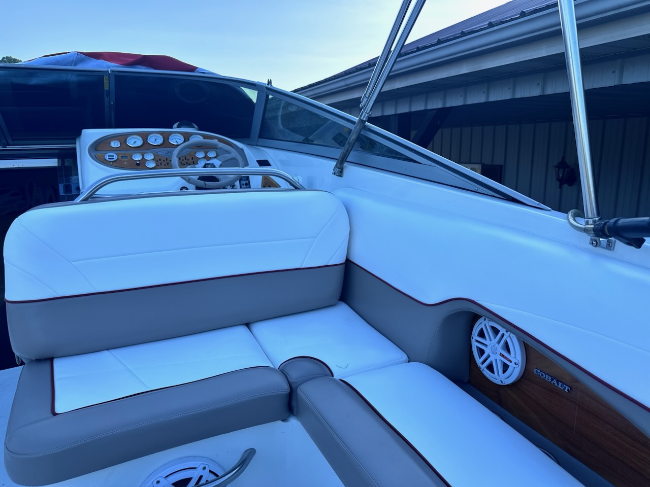 White and gray marine seat upholstery restored by Erbco