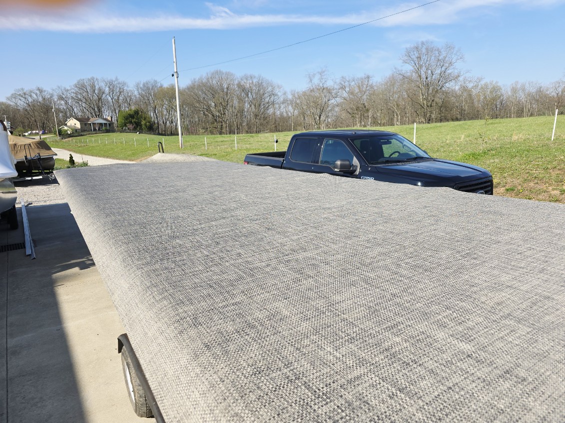 Woven marine vinyl flooring installed on a pontoon deck