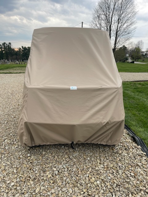 Tan custom cover on a side by side in southeastern Ohio