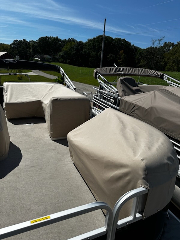 Tan individual seat covers fitted to boat seating by Erbco