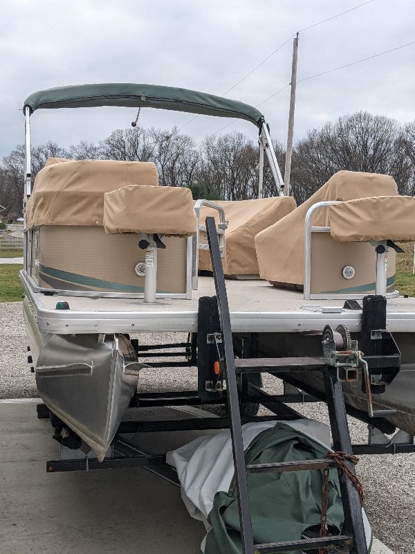 Individual tan covers fitted to pontoon seats in southeastern Ohio