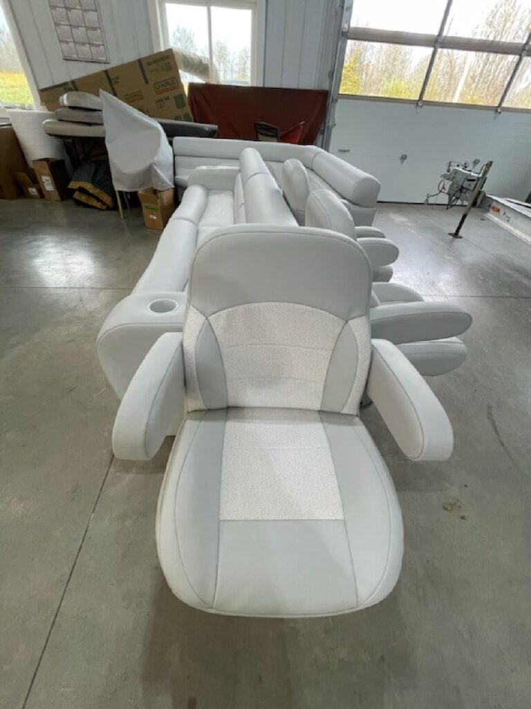 White and gray marine captain's chair in southeastern Ohio