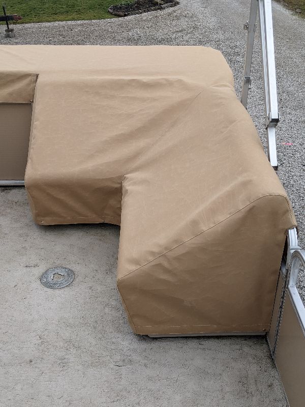 Tan fitted cover over pontoon seating in southeastern Ohio