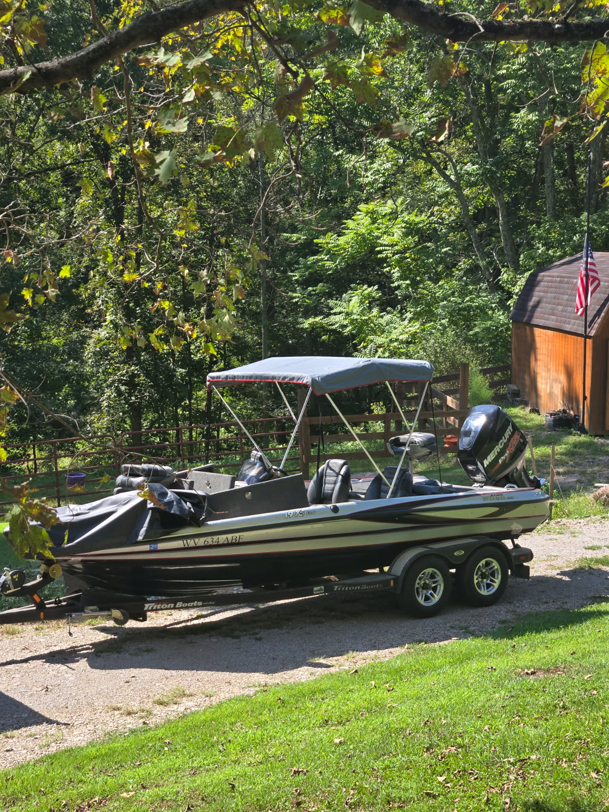 Bass boat with custom cover and bimini top by Erbco in southeastern Ohio