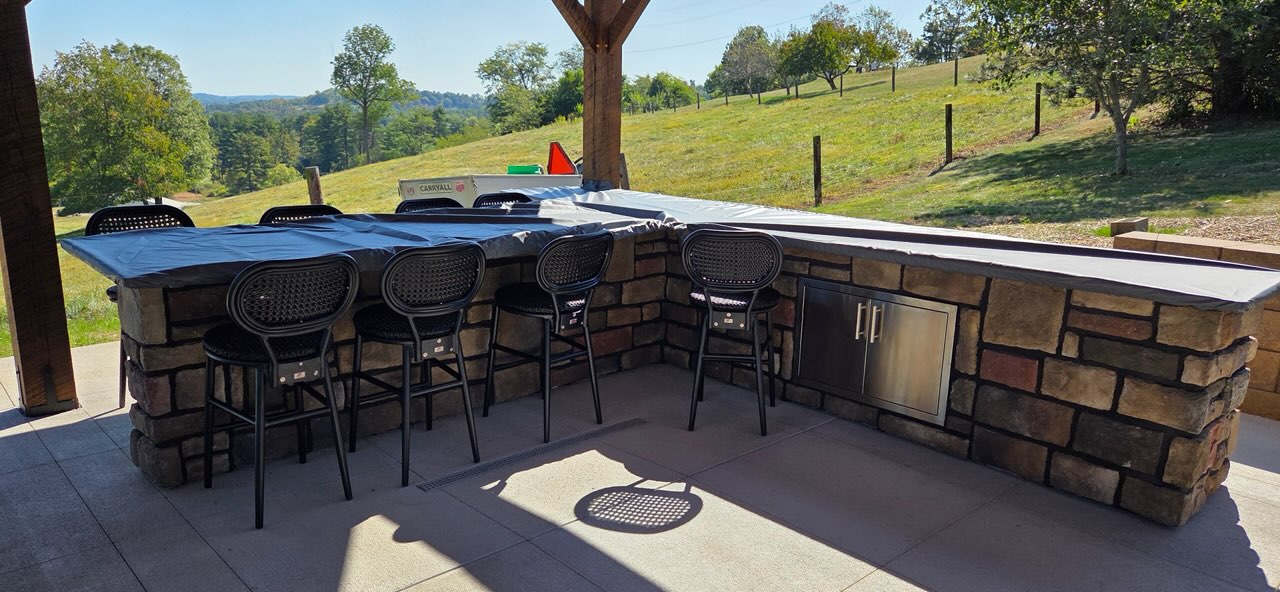 Stone outdoor kitchen before its custom cover in southeastern Ohio