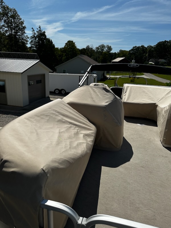 Tan fitted covers on pontoon seating in southeastern Ohio