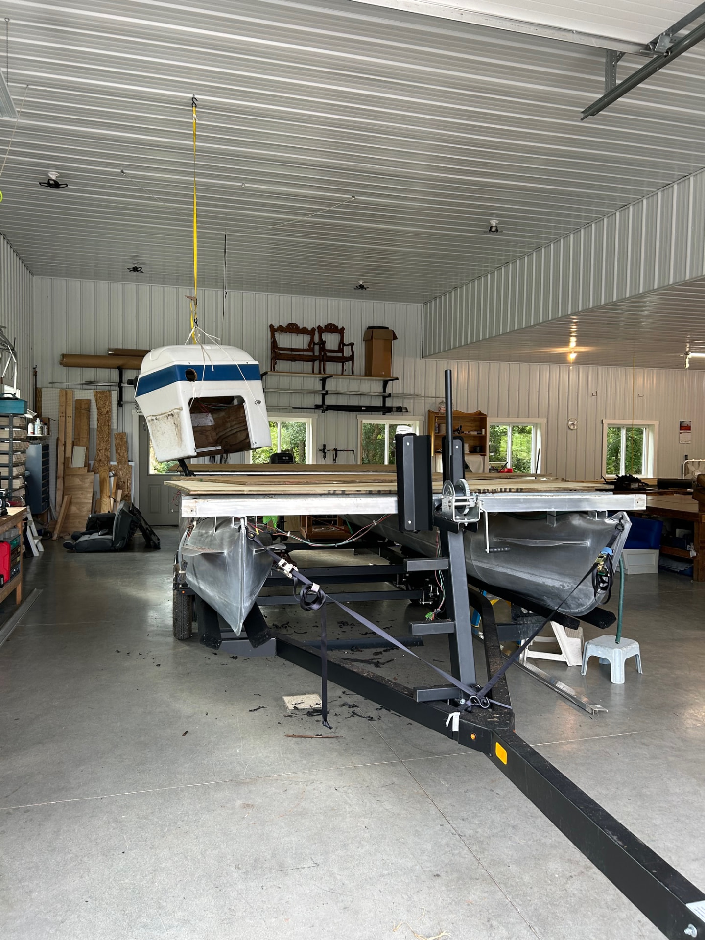 Pontoon deck and helm prepared during restoration in southeastern Ohio