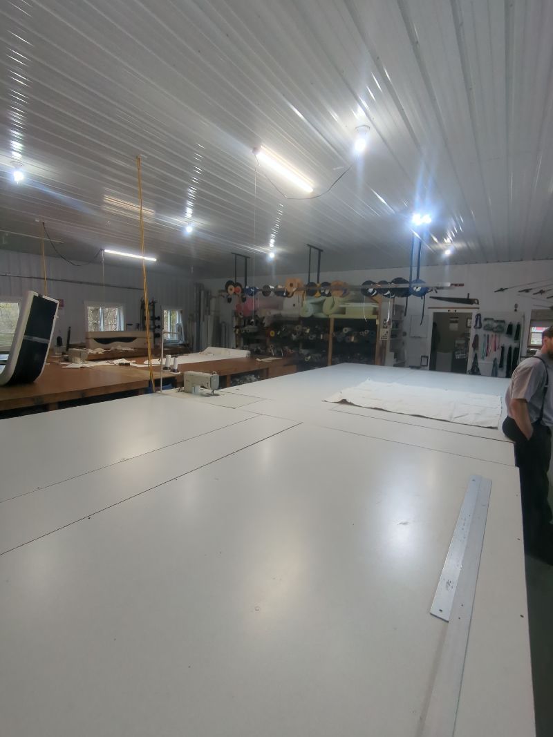 Large cutting table and fabric in the Erbco workshop in southeastern Ohio