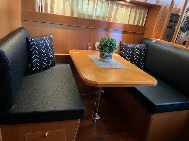 Finished black upholstered boat dinette in southeastern Ohio